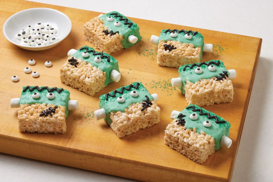Several green Frankenstein Rice Krispies Treats® with sugar sprinkles