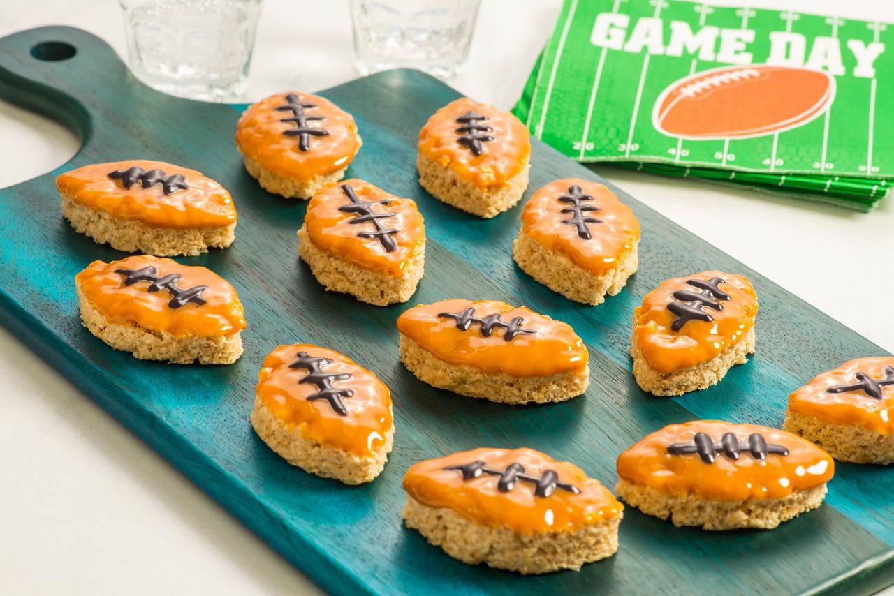 rice krispies treats decorated as footballs
